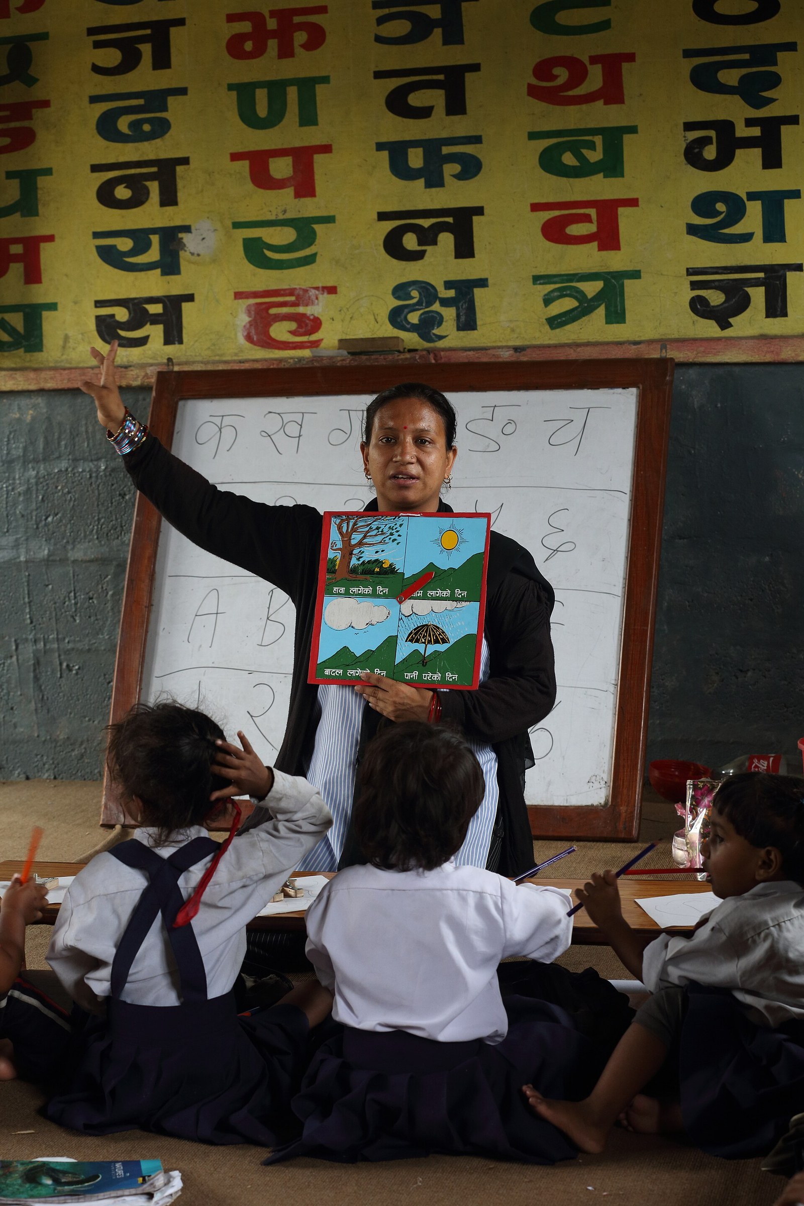 Rukmini Bhattarai is a teacher at the Shree Sahara Bal Primary School, Pokhara , grade1, Pokhara, Nepal. Photo by Jim Holmes for AusAID. (13/2529)